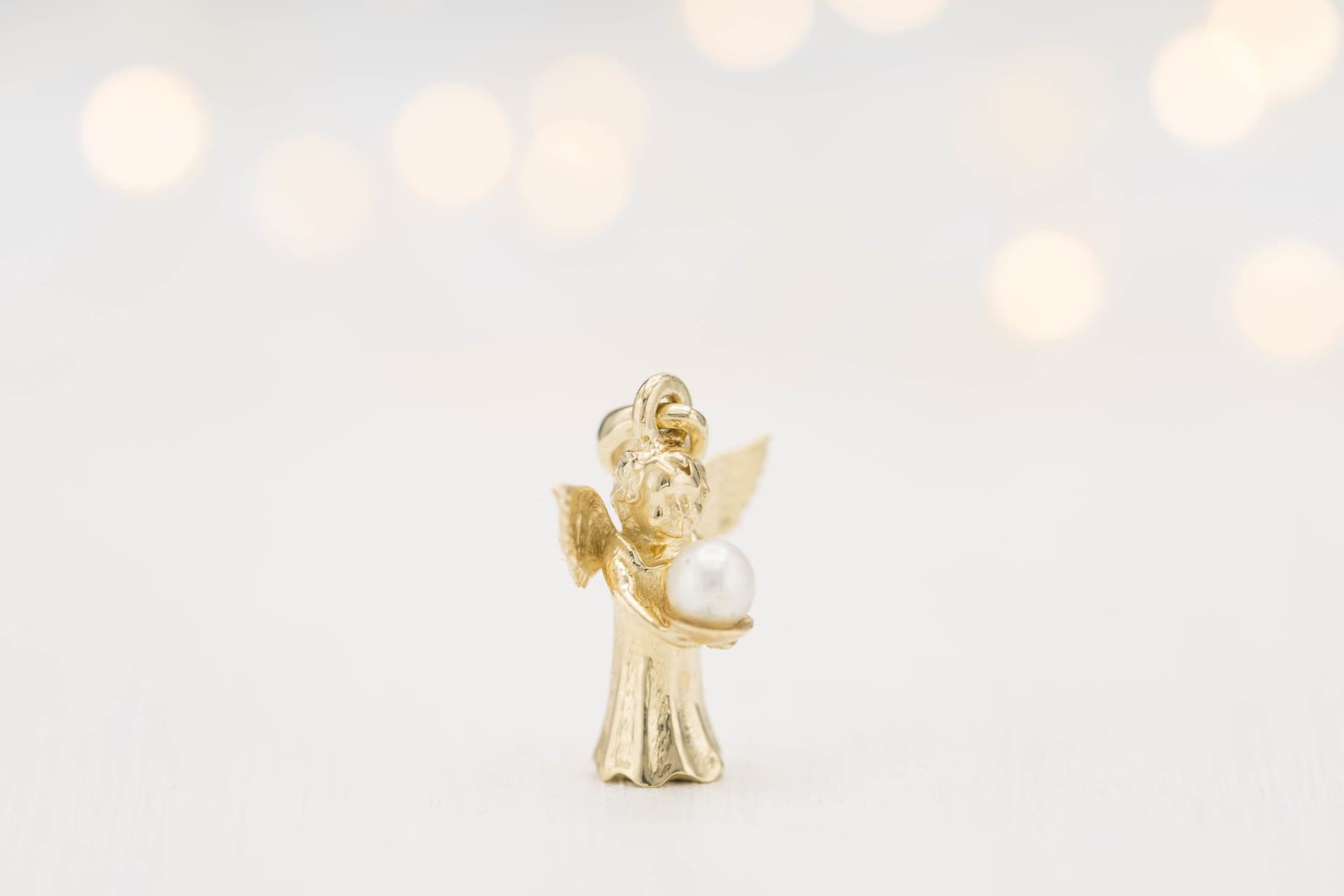 angel pendant with pearl