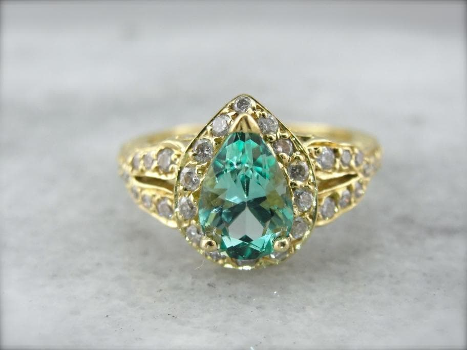 light tone bluish green - emerald engagement ring stone